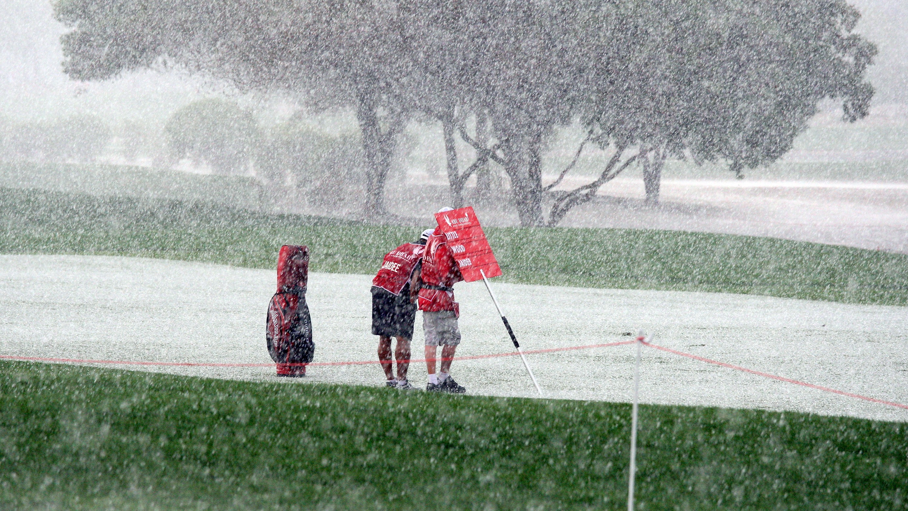 Golf_golfisti_dážď